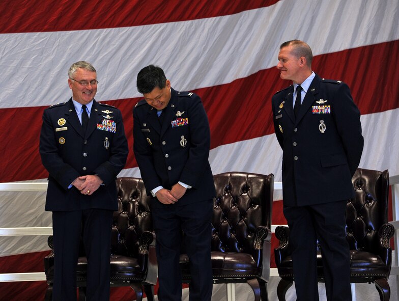 Maj. Gen. Michael Carey, 20th Air Force commander, Col. H.B. Brual, exiting 341st Missile Wing commander, and Col. Robert Stanley, newly appointed 341st MW commander, share some laughs before the change of command ceremony Feb. 8 at the 3-Bay Hangar. Brual has been selected to serve on the Air Force Global Strike Command staff at Barksdale Air Force Base, La. (U.S. Air Force photo/Staff Sgt. R.J. Biermann)