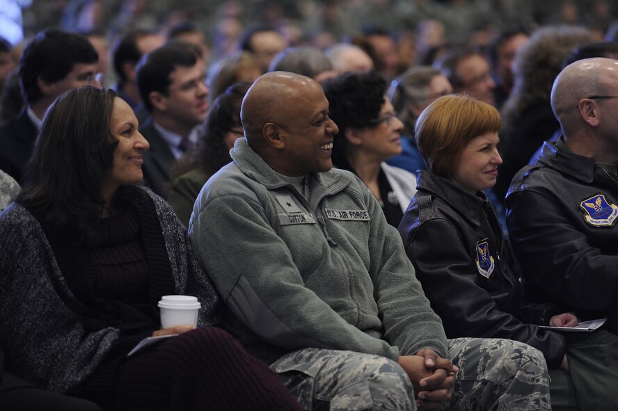 Brig. Gen. Anthony Cotton, 45th Space Wing commander and former 341st Missile Wing commander, laughs as Col. Robert Stanley, newly appointed 341st MW commander, addresses the audience during a change of command ceremony Feb. 8 at the 3 Bay Hangar. (U.S. Air Force photo/Airman 1st Class Katrina Heikkinen)
