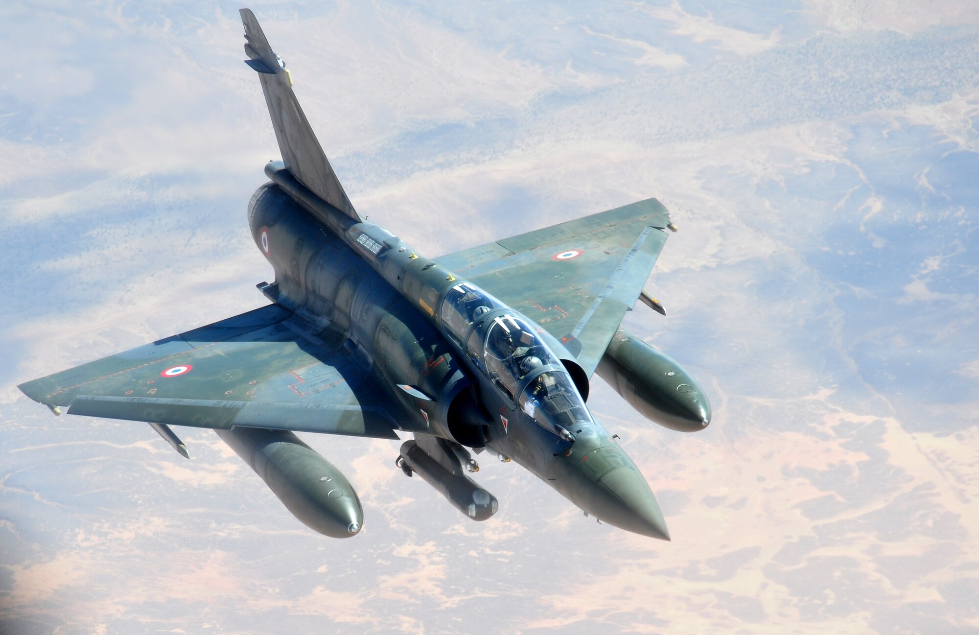 A French Mirage fighter aircraft prepares to refuel from a KC-135 Stratotanker over Africa Jan. 29, 2013. The KC-135 is operating from the 351st Expeditionary Air Refueling Squadron, deployed from the 100th Air Refueling Wing, RAF Mildenhall, England. The Stratotankers are deployed to a base in southwest Europe. (U.S. Air Force photo by Capt. Jason Smith)