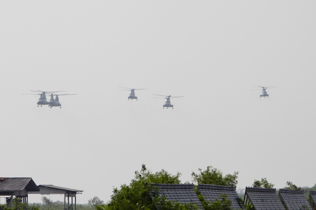 Five U.S. Marine Corps CH-46E Sea Knight helicopters arrive at Utapao, Kingdom of Thailand, Feb. 14 before conducting a flyby during an amphibious assault demonstration part of exercise Cobra Gold 2013. U.S. Marines and sailors from the 31st Marine Expeditionary Unit executed the demonstration alongside Royal Thai Marines. The helicopters are assigned to Marine Medium Helicopter Squadron 262, Marine Aircraft Group 36, 1st Marine Aircraft Wing, III Marine Expeditionary Force.