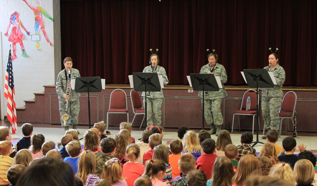 Our clarinet Quartet dazzles young people with their rendition of "Flight of the Bumblebee."