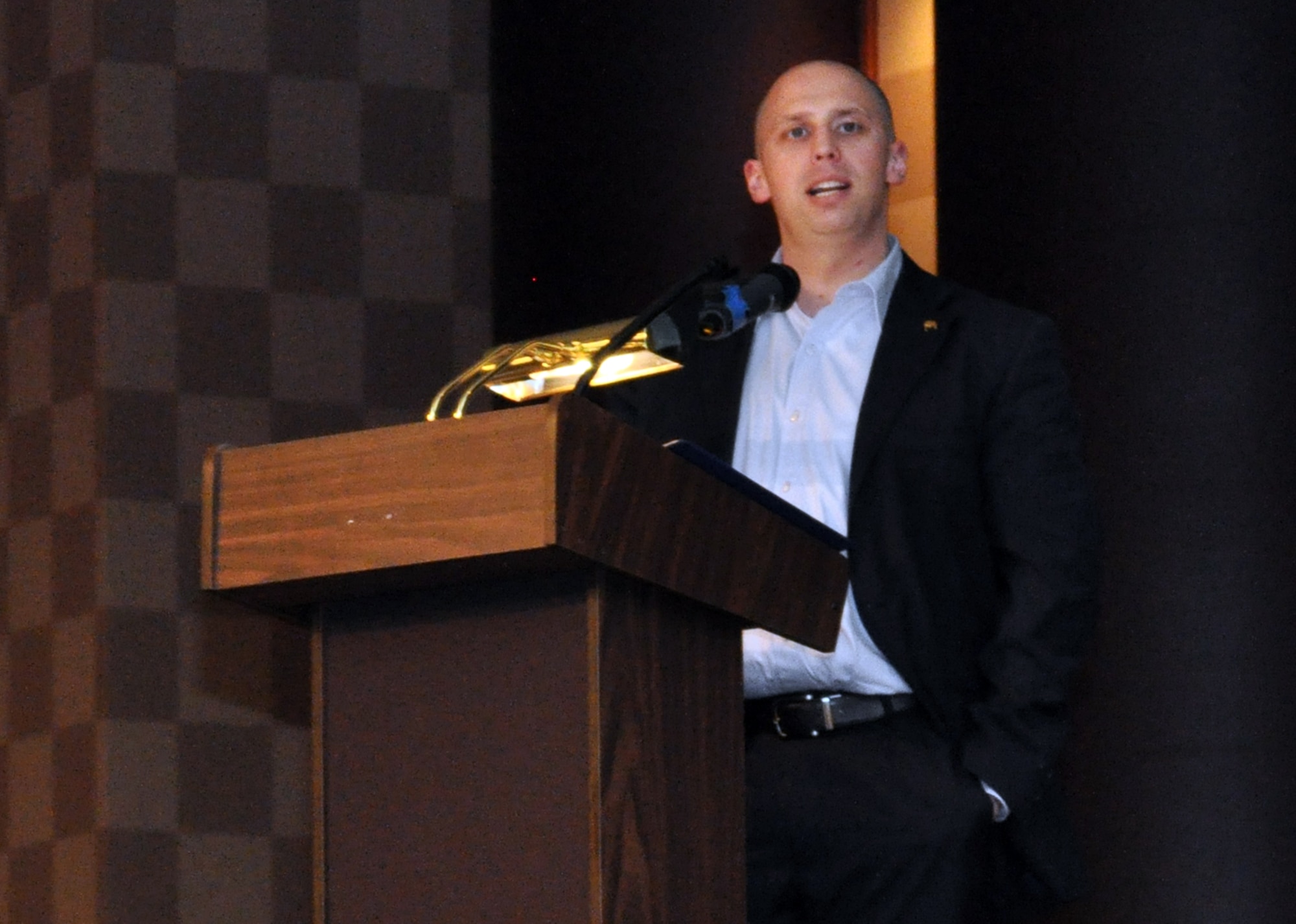 Retired Marine Corps Staff Sgt. Ben Wormington shares his message as the keynote speaker at the inaugural Salute to America’s Heroes dinner with more than 50 wounded warriors and their families at the Omaha Ramada Inn Feb. 16. Wormington is an Omaha native and active with the local VA as well as the Wounded Warrior Project. (Photo by Ryan Hansen)