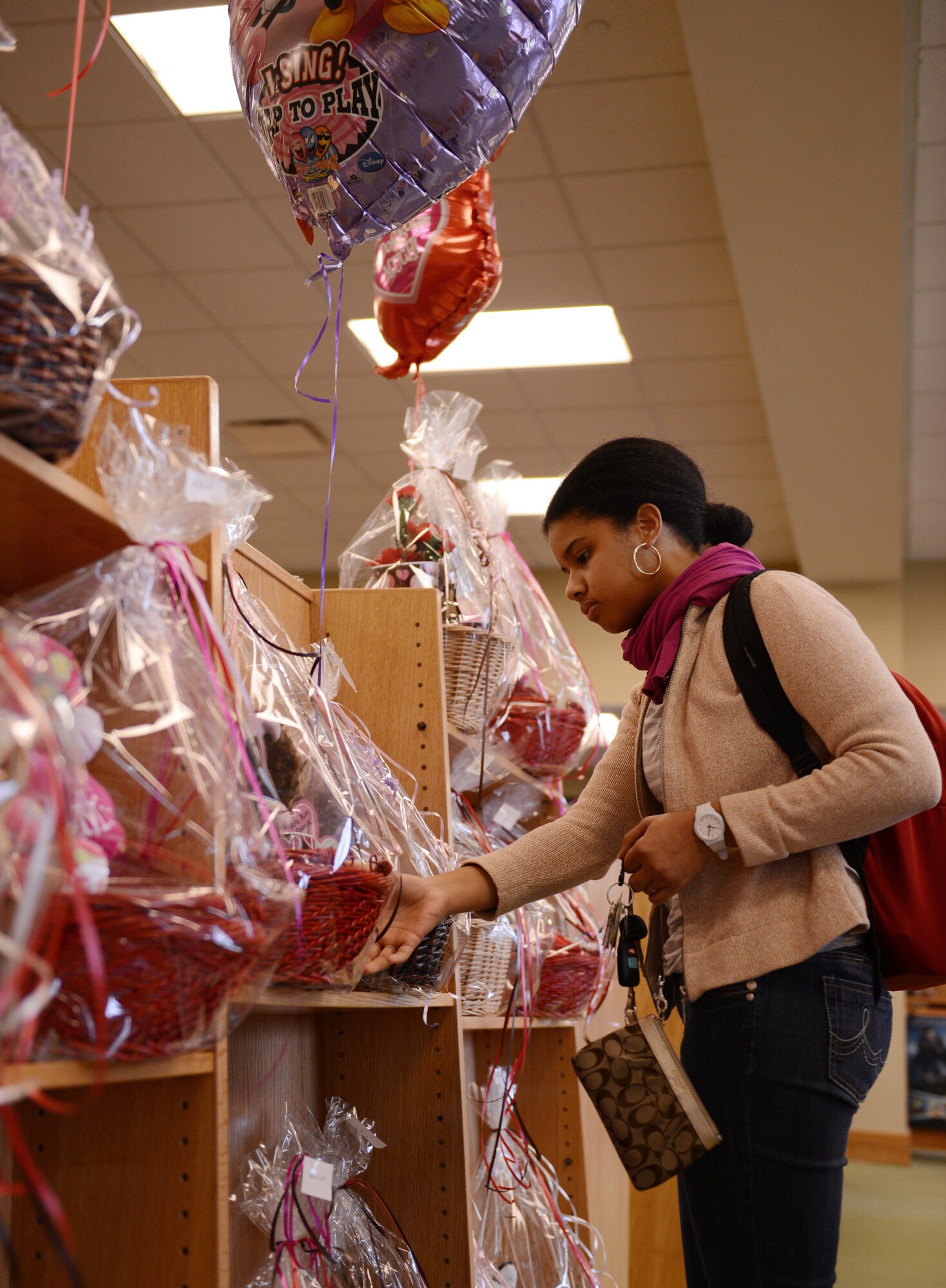 Sheril Benton looks for a Valentine's Day gift for her daughter Johanna at Studio 20, Shaw Air Force Base, S.C., Feb. 14, 2013. Valentine's Day is a celebration held every year on Feb. 14 for people to express love, affection and friendship. (U.S. Air Force photo by Senior Airman Tabatha Zarrella/Released)
