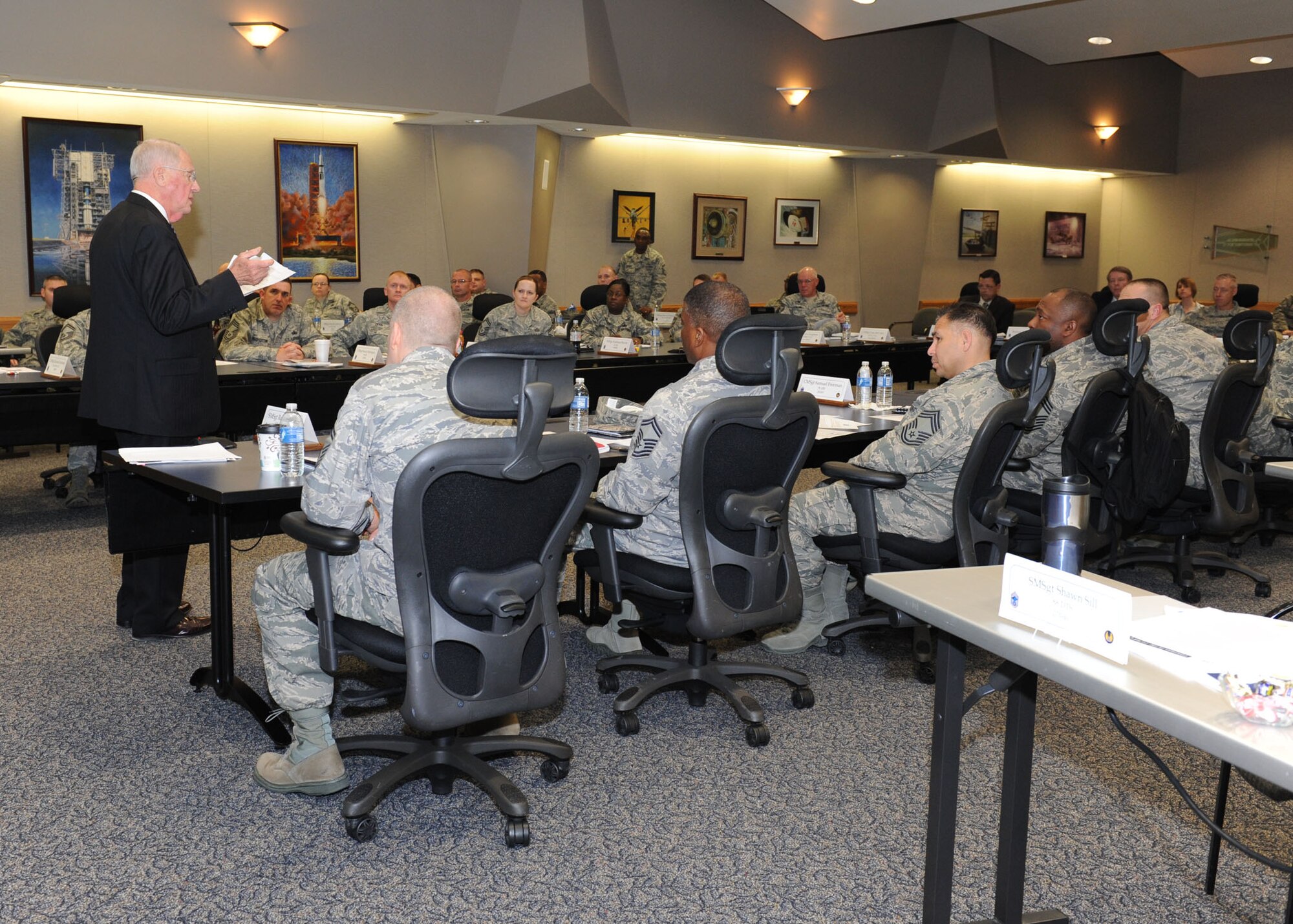 Special class mentor retired Chief Master Sgt. John “Doc” McCauslin shares an update about the Air Force Sergeants' Association at the 2013 Air Force Materiel Command Chiefs' Orientation. (U.S. Air Force photo/ Staff Sgt. Christopher Carwile)