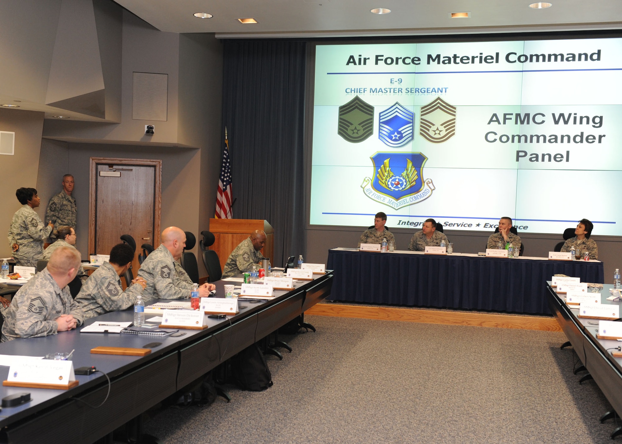 Brig. Gen. William Thornton, Air Force Materiel Command director of Air, Space and Information Operations; Col. Mark Johnson, AFMC deputy director of logistics; Col. Walter Lindsley, AFMC director of staff; and Col. Cassie Barlow, 88th Air Base Wing commander, answer questions at the Wing Commander Panel during the 2013 AFMC Chiefs' Orientation. (U.S. Air Force photo/Staff Sgt. Christopher Carwile)