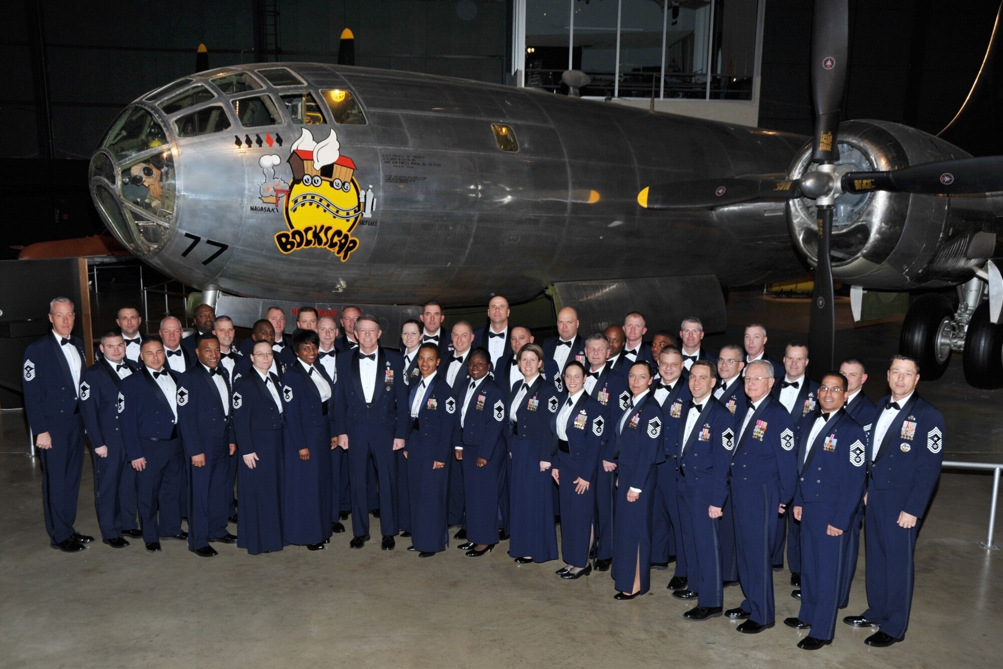 Air Force Materiel Command's newest chief master sergeants pose with Chief Master Sgt. Michael Warner, AFMC command chief (far left), other command chiefs from throughout AFMC and the three special class mentors at the Enlisted Heritage Banquet, the capstone event for the 2013 AFMC Chiefs' Orientation. (U.S. Air Force photo/Ben Strasser)