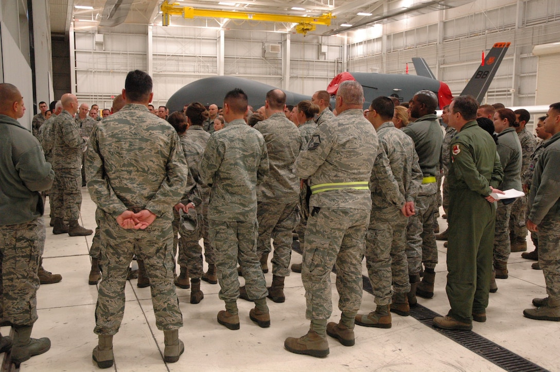 Members of the 13th Reconnaissance Squadron, Beale Air Force Base, Calif.,
gather around leadership at a morning stand-up during the Unit Training
Assembly, Saturday, Feb. 9.  The Reservists received the news that Air Force
Reserve Command had announced the deactivation of the 200-member squadron.
(U.S. Air Force Photo / Dana Lineback)  
