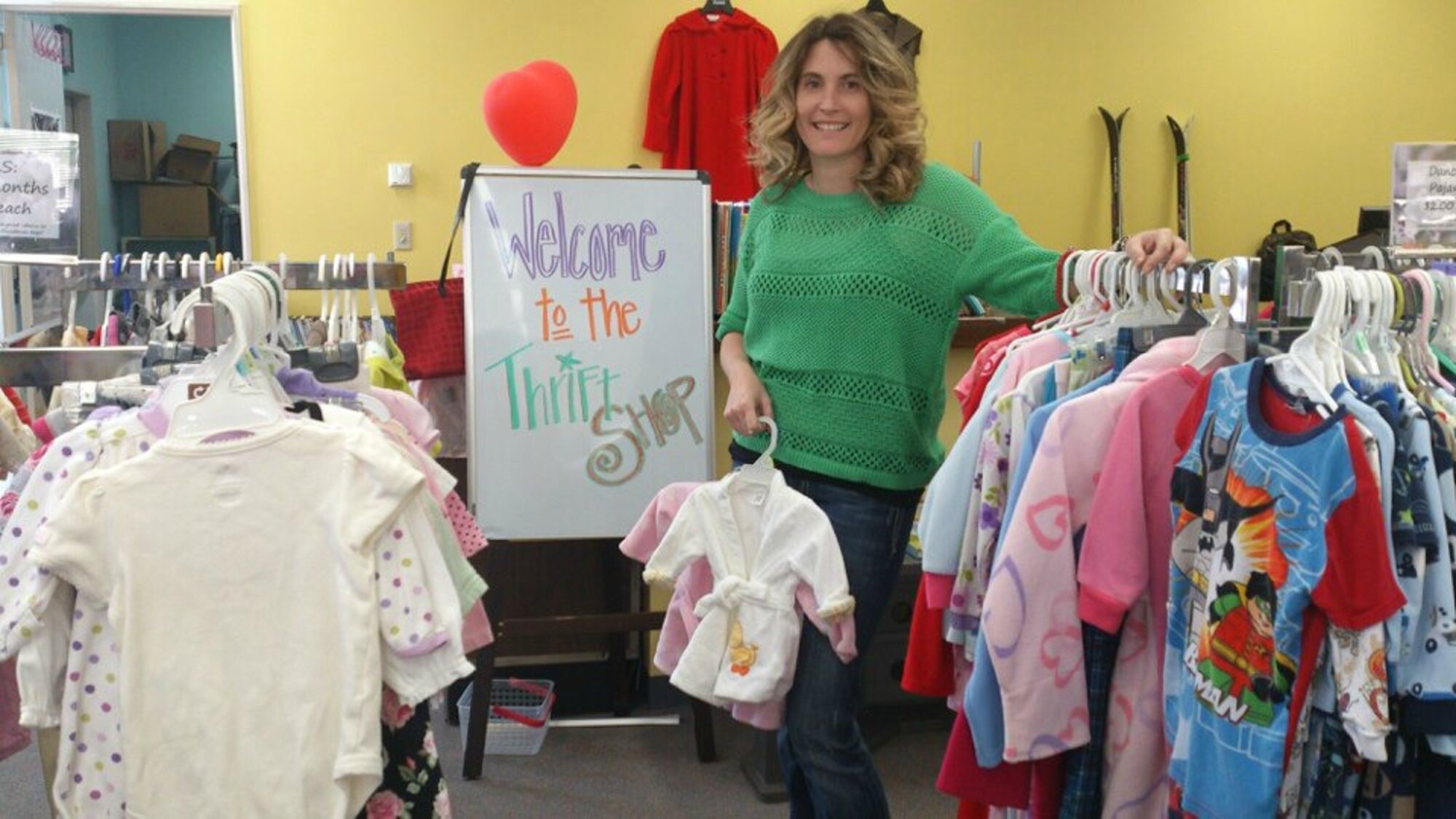 YOKOTA AIR BASE, Japan – Lynn Penton, winner of the PACAF Spouse of the Year award, works at the thrift shop, one of many places where she volunteers.  “Being an Air Force spouse, I would encourage other spouses to get out there and meet the people around you and get involved with the community,” Penton said.  (U.S. photo by Bri Heneke, manager of the YOSC, thrift shop)