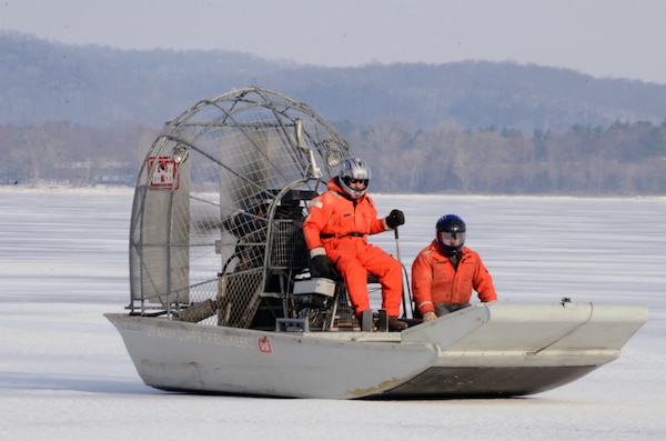 WABASHA, Minn. – U.S. Army Corps of Engineers, St. Paul District employees Al VanGuilder, left, survey technician, and Bill Chelmowski, marine machinery mechanic, use an airboat to measure ice on Lake Pepin, near Wabasha, Minn., Feb. 13, during the first Mississippi River ice surveys of the year. The district conducts the annual ice surveys to help the navigation industry determine when it is safe to break through the ice. Lake Pepin, located on the Mississippi River between Red Wing and Wabasha, Minn., is used as the benchmark because the ice melts slower in this area due to the lake width and the slower current. 