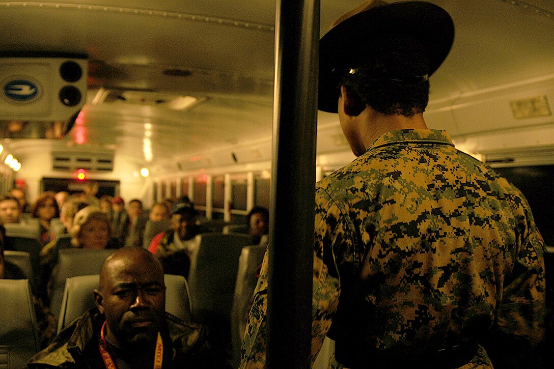 Educators from the Jacksonville and Atlanta area arrive at the recruit receiving center during the Educators Workshop aboard Parris Island, S.C., Feb. 20, 2013. Educators partake in a three-day boot camp to gain a better understandng of the Marine Corps. (U.S. Marine Corps photo by Pfc. John-Paul Imbody)