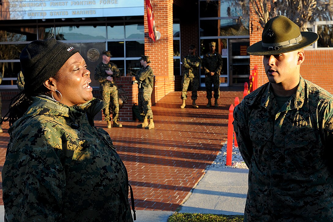 Educators from the Jacksonville and Atlanta area participate in drill movements during an Educators Workshop aboard Parris Island, S.C., Feb. 20, 2013. Educators partake in a three-day boot camp to gain a better understandng of the Marine Corps. (U.S. Marine Corps photo by Pfc. John-Paul Imbody)