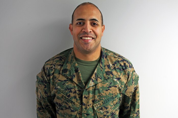 Staff Sgt. Luis A. Rogers, a Sunrise, Fla., native and utilities chief with Combat Logistics Battalion 2, 2nd Marine Logistics Group, poses for a photo aboard Camp Lejeune, N.C., Feb. 19, 2013. Rogers returned to Camp Lejeune Feb. 1, when he met his baby girl for the first time. 