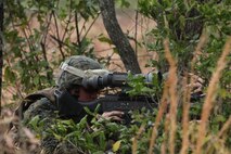 A Marine with 2nd Supply Battalion, Combat Logistics Regiment 25, 2nd Marine Logistics Group provides security at the battalion’s campsite during a field exercise aboard Camp Lejeune, N.C., Feb. 7, 2013. The unit ran a series of convoy operations and patrols designed to test its ability to support 10th Marine Regiment, 2nd Marine Division’s upcoming role in Rolling Thunder.
