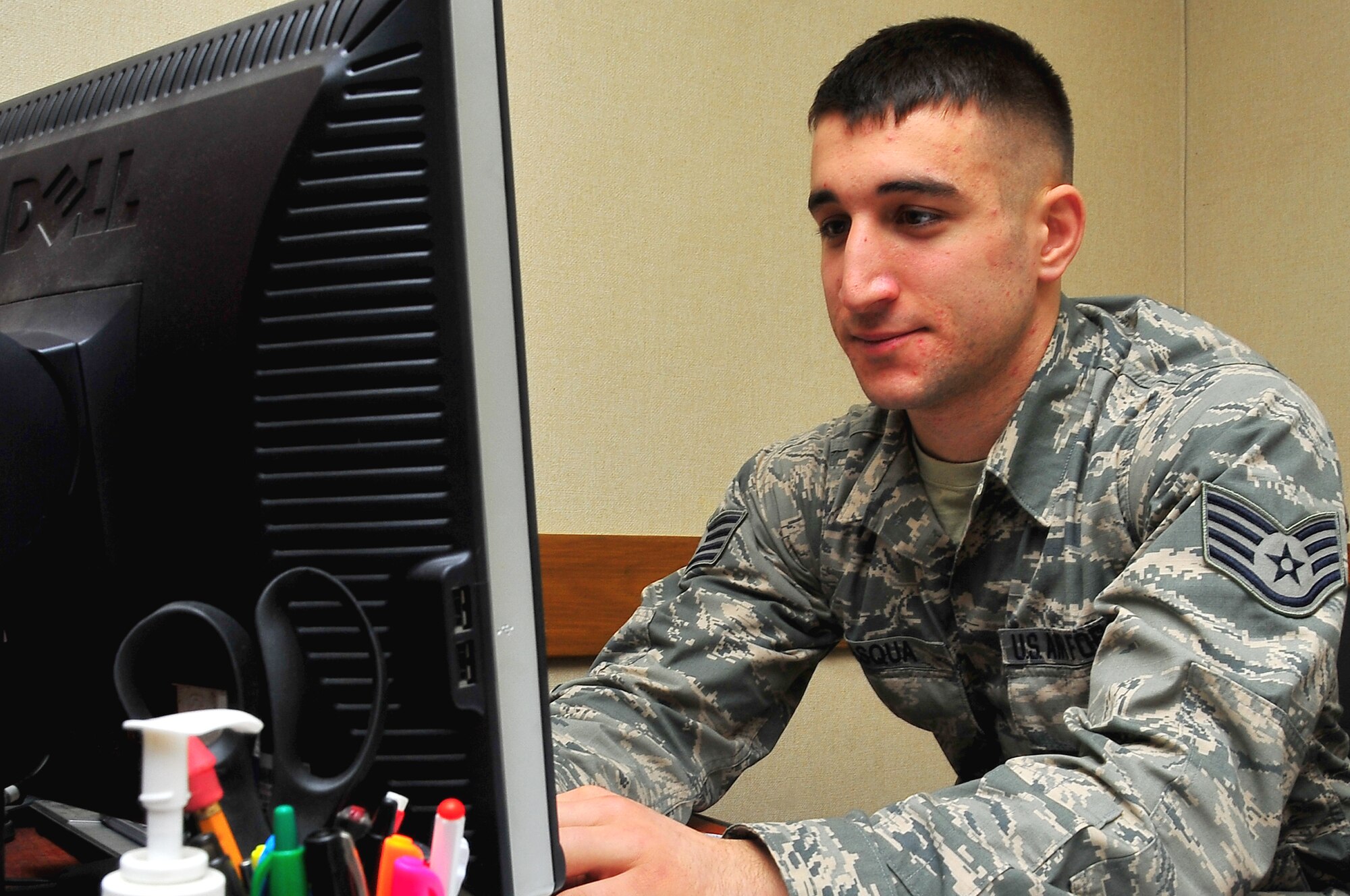 Airman Spotlight: Staff Sgt. Michael Pasqua, 51st Communications Squadron quality assurance evaluator, ensures 51st CS work centers are forming their responsibility of defending the network, at building 949 on Osan Air Base, Republic of Korea Feb. 18 2013.  Pasqua is this weeks Airman Spotlight.  (U.S. Air Force photo/Staff Sgt. Emerson Nuñez) 
