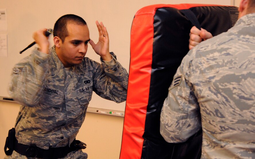Staff Sgt. Justin Sandoval, 2nd Security Forces Squadron, practices strikes with a baton during training on Barksdale Air Force Base, La., Feb. 15. The class taught multiple techniques such as a variety of strikes while armed and unarmed and how to disable an assailant. (U.S. Air Force photo/Airman 1st Class Andrew Moua)
