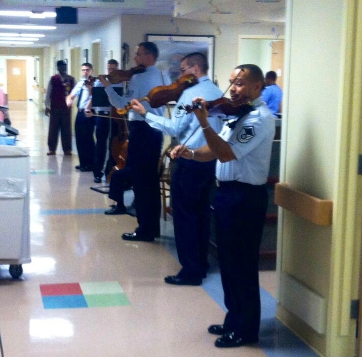 The Air Force Strings serenade the patients and staff at Baltimore's VA Hospital in observance of National Salute Week (AF photo by Tech. Sgt. Ni Santiago)