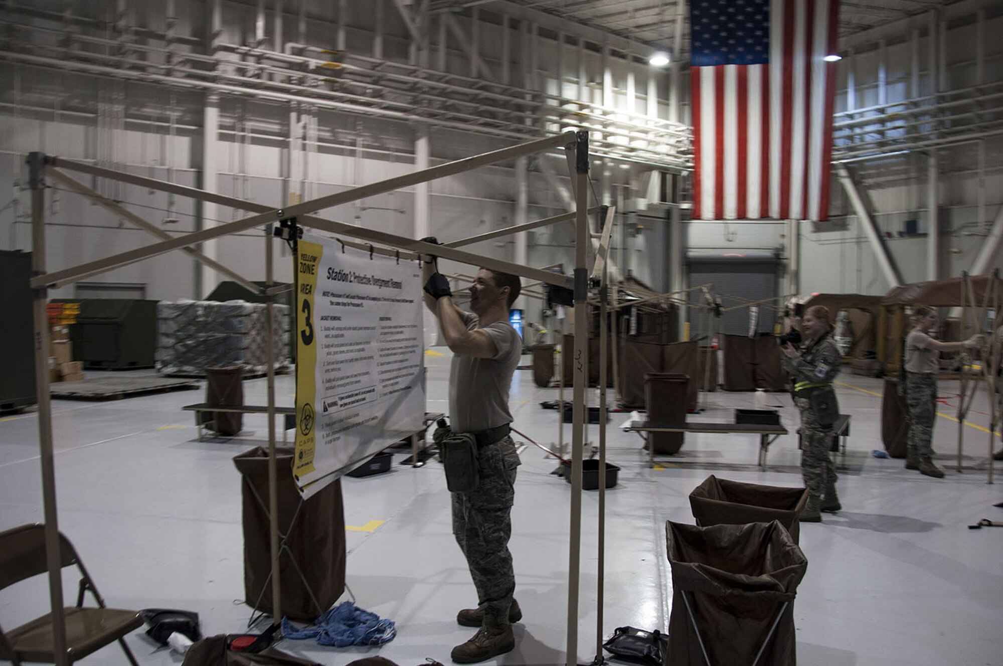 Members of the 349th Air Mobility Wing and 60th AMW worked together during an Operational Readiness Inspection during the week of February 4, at the Combat Readiness Training Center in Gulfport, Miss. ORI's are intended to test Airmen on their ability to deploy at a moments notice and be fully capable of establising and maintaining a base under various threat conditions while in chemical warfare mission oriented protective equipment. (U.S. Air Force photo)