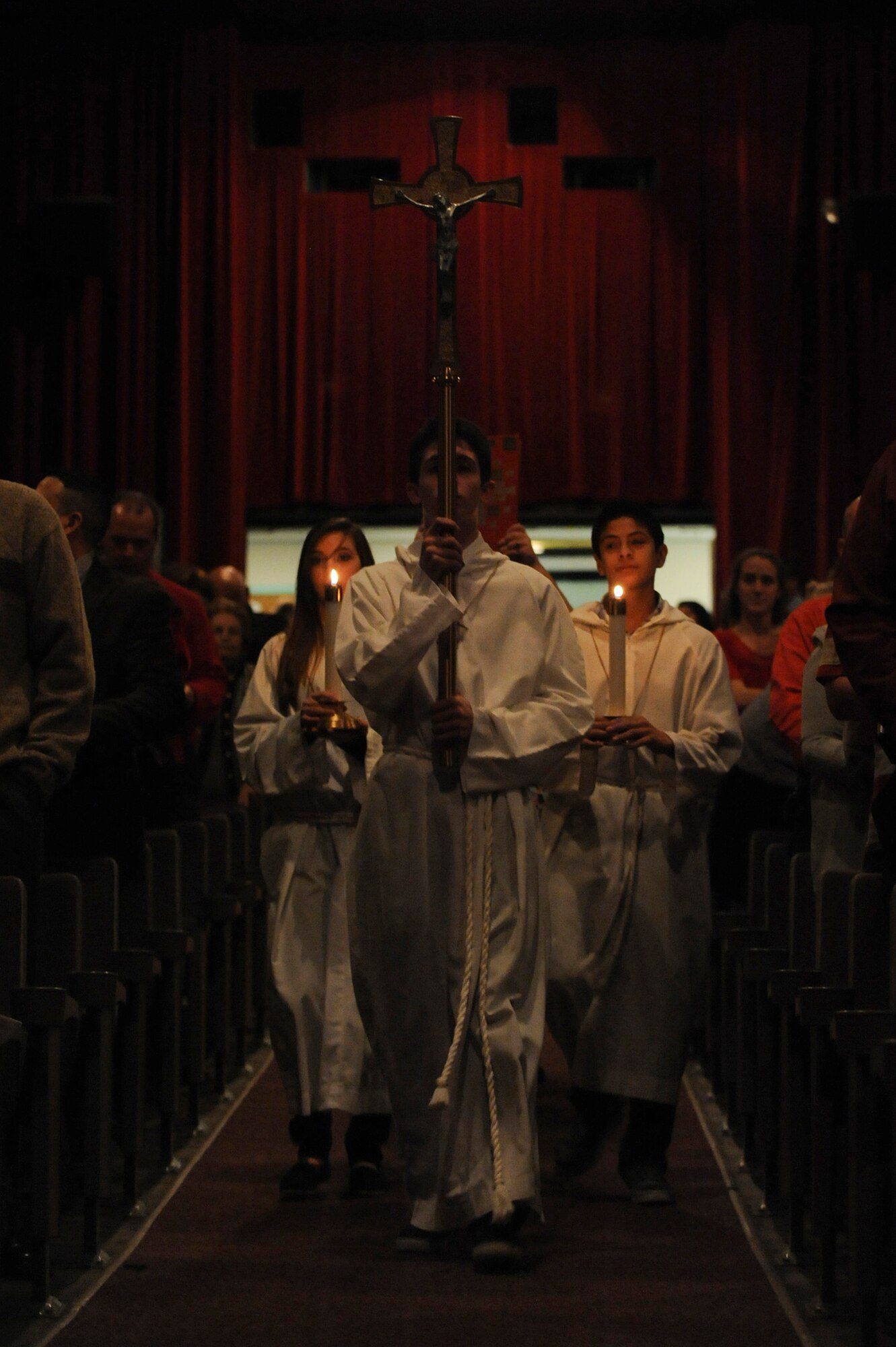 Team Little Rock members participate in Christmas mass Dec. 24, 2012, at Little Rock Air Force Base, Ark. Christmas mass was one of three religious services held on Christmas Eve.(U.S. Air Force photo by Airman 1st Class Rusty Frank)