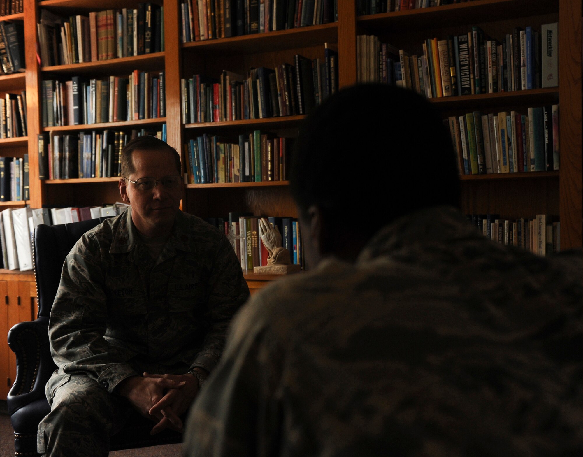 Chaplain (Maj.) Randall Jamieson, 19th Airlift Wing deputy wing chaplain, councils an Airman Dec. 6, 2012, at Little Rock Air Force Base, Ark. Counseling sessions are one of many tools chaplains use to assist Airmen. (U.S. Air Force photo by Airman 1st Class Rusty Frank)