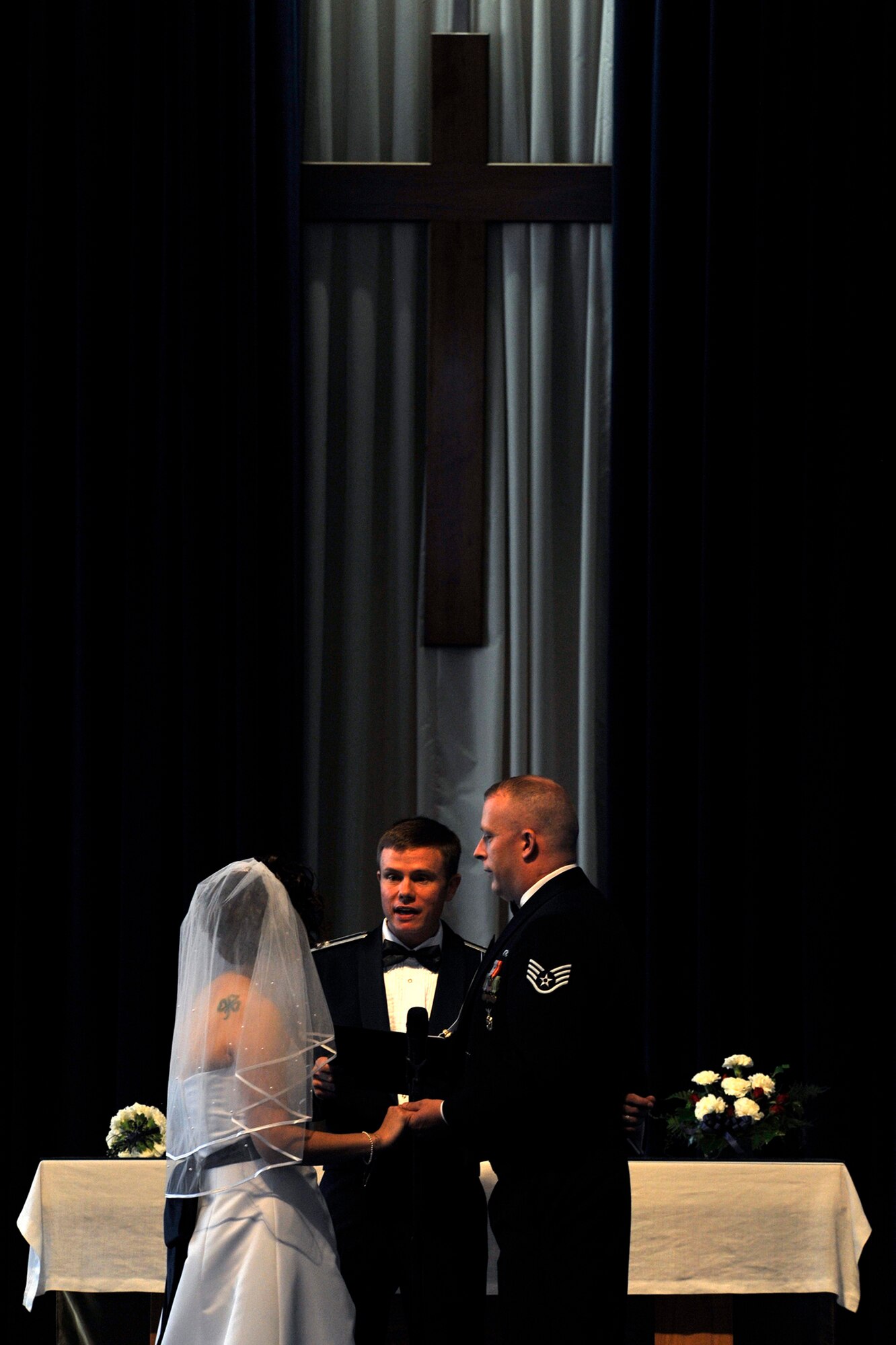 Chaplain (Capt.) William Martin, a 19th Airlift Wing chaplain, speaks during a marriage ceremony Sept. 1, 2012, at Little Rock Air Force Base, Ark. Weddings are one of many ceremonies chaplains officiate.(U.S. Air Force photo by Airman 1st Class Rusty Frank)
