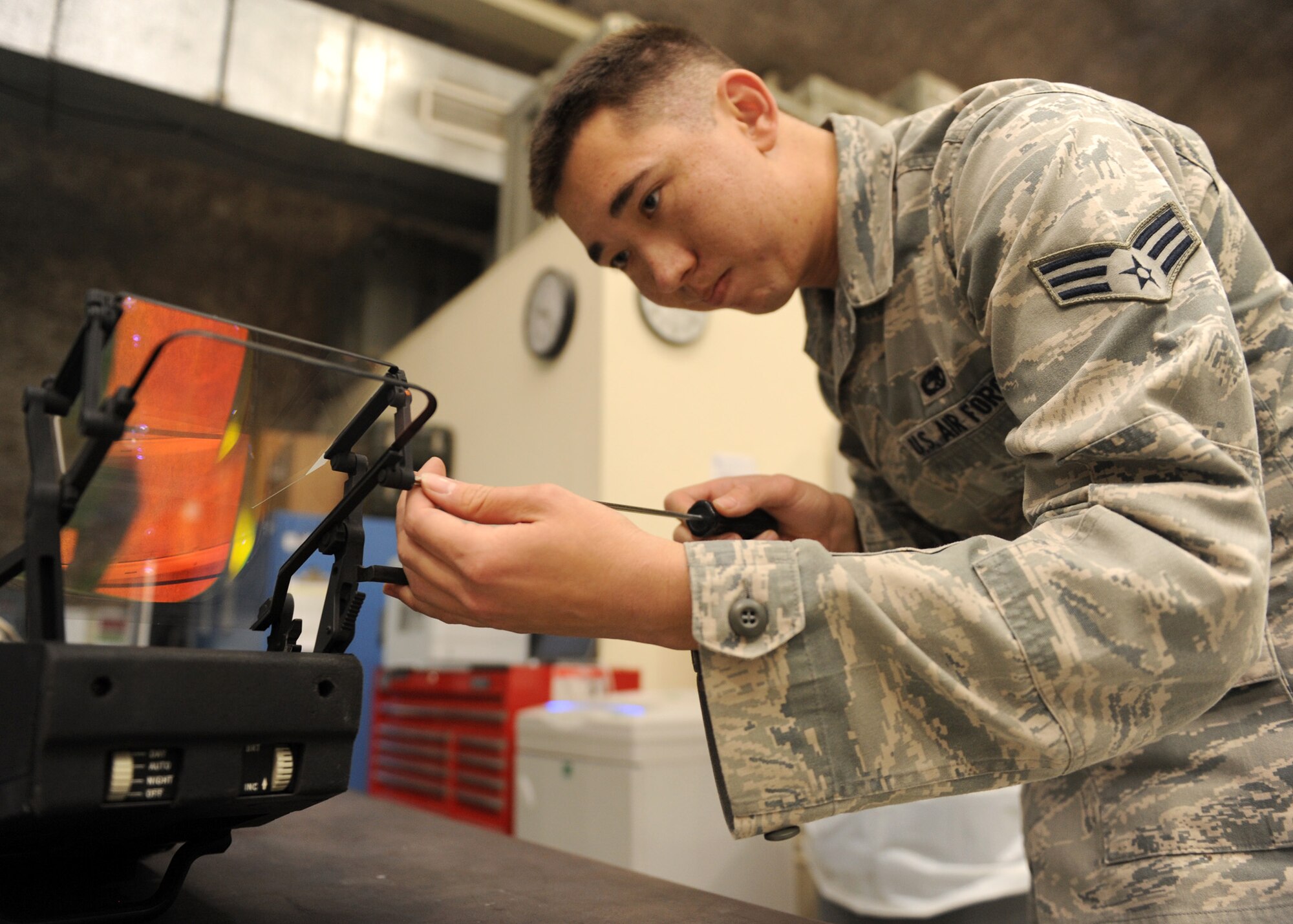 SOUTHWEST ASIA – Senior Airman Robert Mangrum, 379th Expeditionary Maintenance Squadron, repairs a heads-up-display for a C-17 Feb. 19. The avionics Airmen work anything from radar to heads-up displays to electronic warfare equipment. Mangrum is deployed from 62nd Maintenance Squadron at McChord Air Force Base, Wash. (U.S. Air Force photo/Senior Airman Joel Mease)