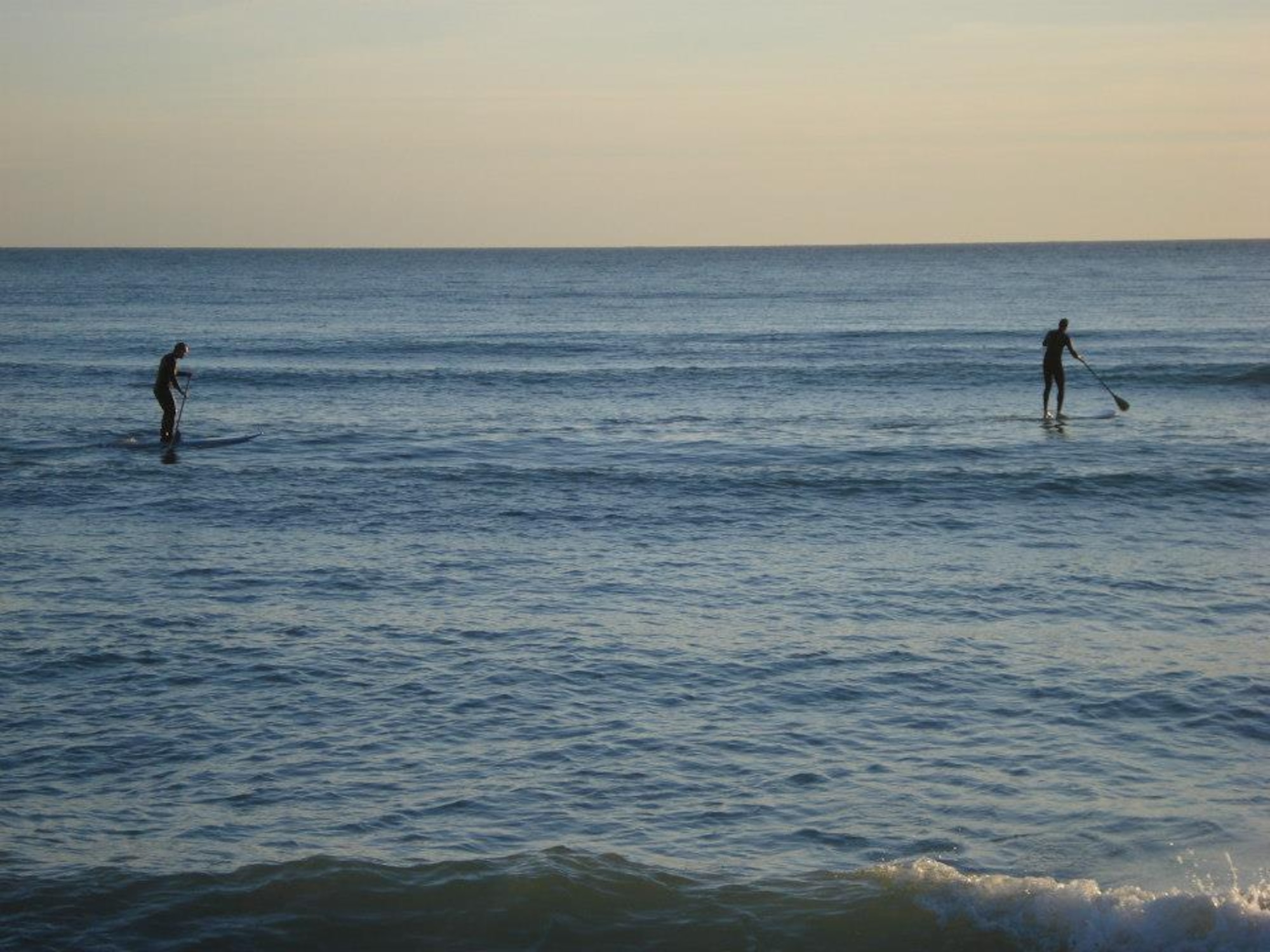 Two paddle boarders enjoy the Balearic Sea Jan. 25, 2013, off the coast of Majorca, Spain.  Being in, or on, the water is a common pastime for residents and tourists of Majorca. (U.S. Air Force photo by 1st Lt. Laura Balch/Released)