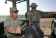 Senior Airman Kyle Paridee and Master Sgt. Shane Cox, 386th Civil Engineering Squadron operate inside a grader at a deployed base in Southwest Asia Feb. 18, 2013. The Dirt Boyz construct and maintain concrete and asphalt runways, aircraft parking aprons, and roads using a variety of heavy construction equipment, such as, loaders, graders, dozers, backhoes, and dump trucks. (U.S. Air Force photo by Senior Master Sgt. George Thompson)