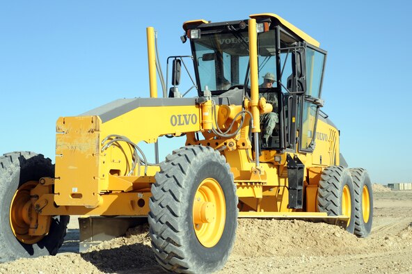 Master Sgt. Shane Cox, 386th Civil Engineering Squadron, rough grades a construction project at a deployed base in Southwest Asia Feb. 13, 2013. The Dirt Boyz construct and maintain concrete and asphalt runways, aircraft parking aprons, and roads using a variety of heavy construction equipment, such as, loaders, graders, dozers, backhoes, and dump trucks. (U.S. Air Force photo by Senior Master Sgt. George Thompson)