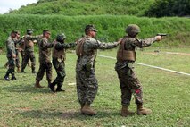 U.S. Marines from Combat Logistics Regiment 3 conducted a bilateral pistol shoot with Royal Thai Marines Feb. 16 in Sattahip, Chonburi province, Kingdom of Thailand, to further their military relationship during exercise Cobra Gold 2013. The exercise is a Thai-U.S. co-sponsored multinational, multiservice exercise giving forces from Thailand, the U.S., Singapore, Japan, Republic of Korea, Indonesia, Malaysia and observer nations, an opportunity to strengthen military-to-military relations and enhance interoperability. CLR-3 is part of 3rd Marine Logistics Group, III Marine Expeditionary Force.