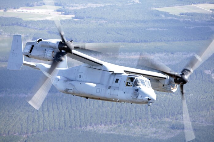 Marines with Marine Medium Tiltrotor Squadron 365 fly an MV-22B Osprey while conducting the squadron's largest flight ever, Feb. 20. The flight consisted of 10 aircraft taking off, maneuvering and landing together, as well as six of the aircraft conducting air-to-air refueling. Almost all of the Marines in VMM-365 participated in the flight in some way.
