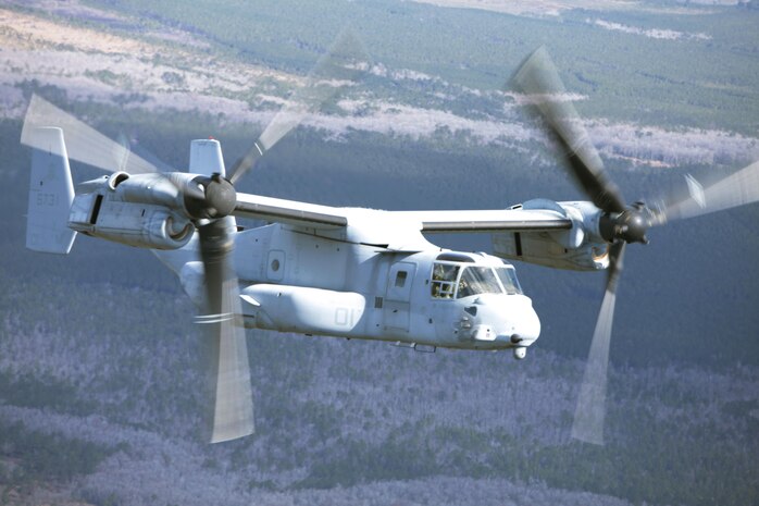 Marines with Marine Medium Tiltrotor Squadron 365 fly an MV-22B Osprey while conducting the squadron's largest flight ever, Feb. 20. The flight consisted of 10 aircraft taking off, maneuvering and landing together, as well as six of the aircraft conducting air-to-air refueling. Almost all of the Marines in VMM-365 participated in the flight in some way.