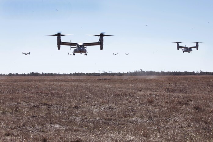 Marines with Marine Medium Tiltrotor Squadron 365 fly MV-22B Ospreys while conducting the squadron's largest flight ever, Feb. 20. The flight consisted of 10 aircraft taking off, maneuvering and landing together, as well as six of the aircraft conducting air-to-air refueling. Almost all of the Marines in VMM-365 participated in the flight in some way.