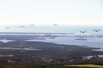 Marines with Marine Medium Tiltrotor Squadron 365 fly MV-22B Ospreys while conducting the squadron's largest flight ever, Feb. 20. The flight consisted of 10 aircraft taking off, maneuvering and landing together, as well as six of the aircraft conducting air-to-air refueling. Almost all of the Marines in VMM-365 participated in the flight in some way.