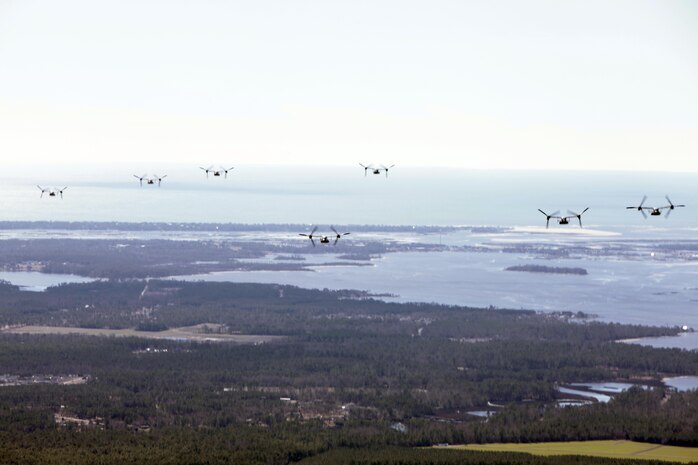 Marines with Marine Medium Tiltrotor Squadron 365 fly MV-22B Ospreys while conducting the squadron's largest flight ever, Feb. 20. The flight consisted of 10 aircraft taking off, maneuvering and landing together, as well as six of the aircraft conducting air-to-air refueling. Almost all of the Marines in VMM-365 participated in the flight in some way.