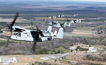 Marines with Marine Medium Tiltrotor Squadron 365 fly MV-22B Ospreys while conducting the squadron's largest flight ever, Feb. 20. The flight consisted of 10 aircraft taking off, maneuvering and landing together, as well as six of the aircraft conducting air-to-air refueling. Almost all of the Marines in VMM-365 participated in the flight in some way.