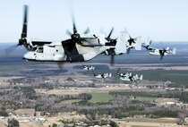 Marines with Marine Medium Tiltrotor Squadron 365 fly MV-22B Ospreys while conducting the squadron's largest flight ever, Feb. 20. The flight consisted of 10 aircraft taking off, maneuvering and landing together, as well as six of the aircraft conducting air-to-air refueling. Almost all of the Marines in VMM-365 participated in the flight in some way.