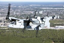 Marines with Marine Medium Tiltrotor Squadron 365 fly MV-22B Ospreys while conducting the squadron's largest flight ever, Feb. 20. The flight consisted of 10 aircraft taking off, maneuvering and landing together, as well as six of the aircraft conducting air-to-air refueling. Almost all of the Marines in VMM-365 participated in the flight in some way.