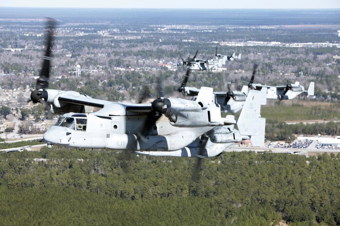 Marines with Marine Medium Tiltrotor Squadron 365 fly MV-22B Ospreys while conducting the squadron's largest flight ever, Feb. 20. The flight consisted of 10 aircraft taking off, maneuvering and landing together, as well as six of the aircraft conducting air-to-air refueling. Almost all of the Marines in VMM-365 participated in the flight in some way.