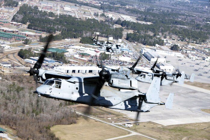 Marines with Marine Medium Tiltrotor Squadron 365 fly MV-22B Ospreys while conducting the squadron's largest flight ever, Feb. 20. The flight consisted of 10 aircraft taking off, maneuvering and landing together, as well as six of the aircraft conducting air-to-air refueling. Almost all of the Marines in VMM-365 participated in the flight in some way.