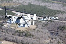 Marines with Marine Medium Tiltrotor Squadron 365 fly MV-22B Ospreys while conducting the squadron's largest flight ever, Feb. 20. The flight consisted of 10 aircraft taking off, maneuvering and landing together, as well as six of the aircraft conducting air-to-air refueling. Almost all of the Marines in VMM-365 participated in the flight in some way.