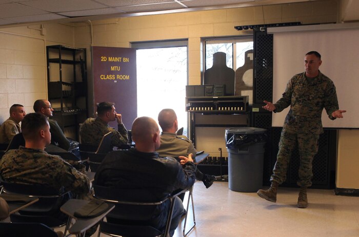 Staff Sgt. Shannon J. Zigan, the motorcycle safety representative for 2nd Maintenance Battalion, Combat Logistics Regiment 25, 2nd Marine Logistics Group, briefs the battalion’s motorcycle enthusiasts during a quarterly motorcycle safety meeting aboard Camp Lejeune, N.C., Feb. 15, 2013. The servicemembers use the time as a chance to pass new Marine Corps regulations regarding motorcycles and work on their own safety procedures. 