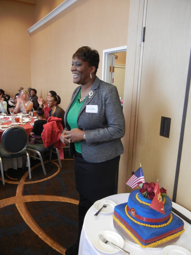 Parisa Fetherson, manager for Quantico’s Personal and Professional Development program, and president of the Women Marines Association Crossroads chapter, addresses the more than 70 members of the D.C. and Virginia chapters who attended the anniversary of women in the Marine Corps at the Sheraton Pentagon City Hotel in Arlington on Feb. 16. 