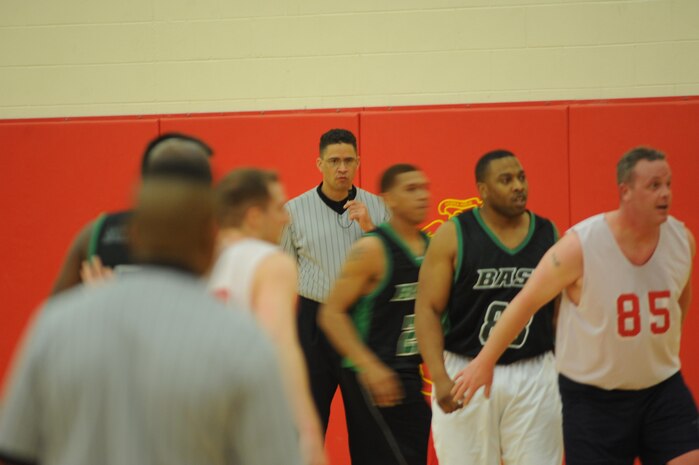 J.P. Duckett, a 9-year officiating veteran, surveys the action during a intramural basketball game on Feb. 14. Duckett is one of many officials who keep order on the hardwood during the season.