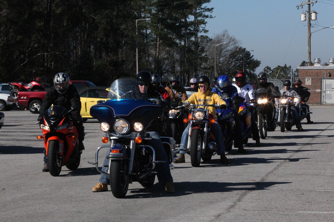 Servicemembers with 2nd Maintenance Battalion, Combat Logistics Regiment 25, 2nd Marine Logistics Group line up before taking their motorcycles out for a ride during a motorcycle rally aboard Camp Lejeune, N.C., Feb. 15, 2013. The rally served as an opportunity for the battalion’s riders to hone their safety skills and share information with each other. 