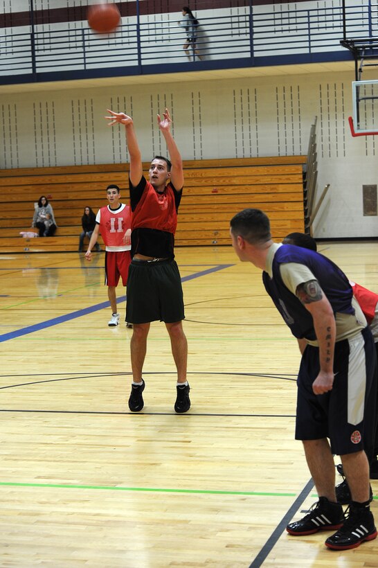 1st Lt. Stephen Kaiser, 432nd Attack Squadron pilot, shoots a free throw during the base 2013 Intramural Basketball League tournament in the Bellamy Fitness Center at Ellsworth Air Force Base, S.D., Feb. 19, 2013. The league, comprised of 10 teams, showcased some of Ellsworth’s finest basketball players battling it out on the hardwood. (U.S. Air Force photo by Airman 1st Class Hrair H. Palyan/Released)