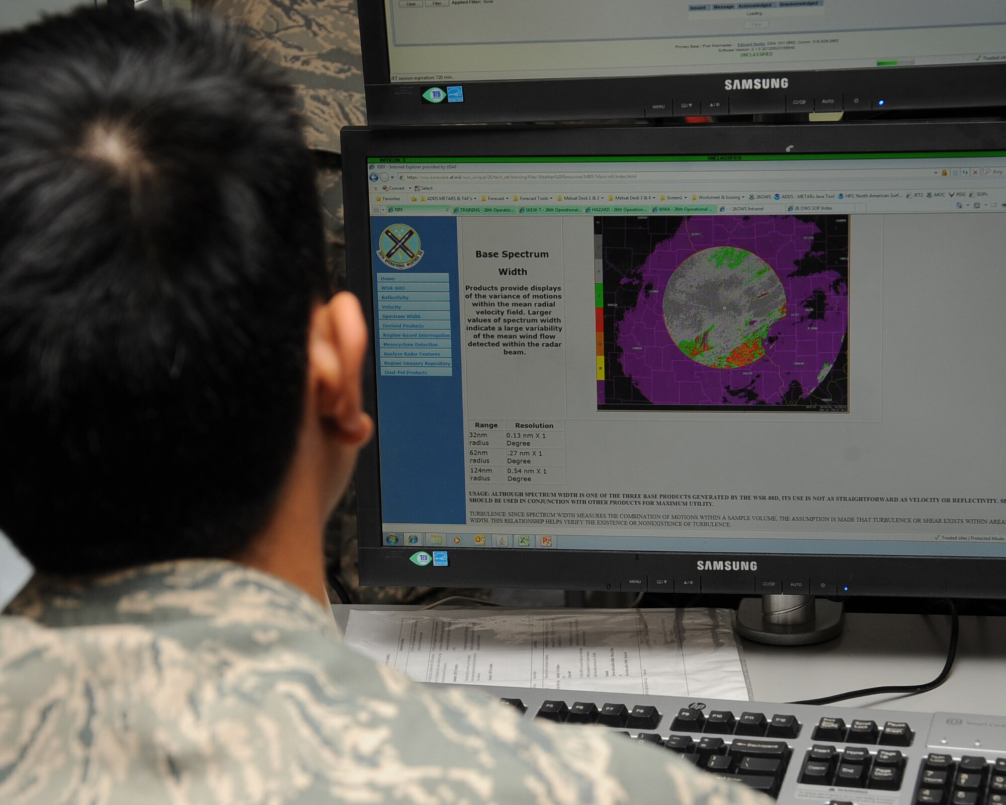 Airman 1st Class Andre Basay, 26th Operational Weather Squadron weather forecaster, tracks a storm on Barksdale Air Force Base, La., Feb. 21. Airmen assigned to the 26 OWS begin a 12-week class before moving to the floor to begin forecasting. Airmen must work at least 10 shifts under the direct supervision of a qualified forecaster before receiving a final evaluation known as a check ride. (U.S. Air Force photo/Senior Airman Sean Martin)