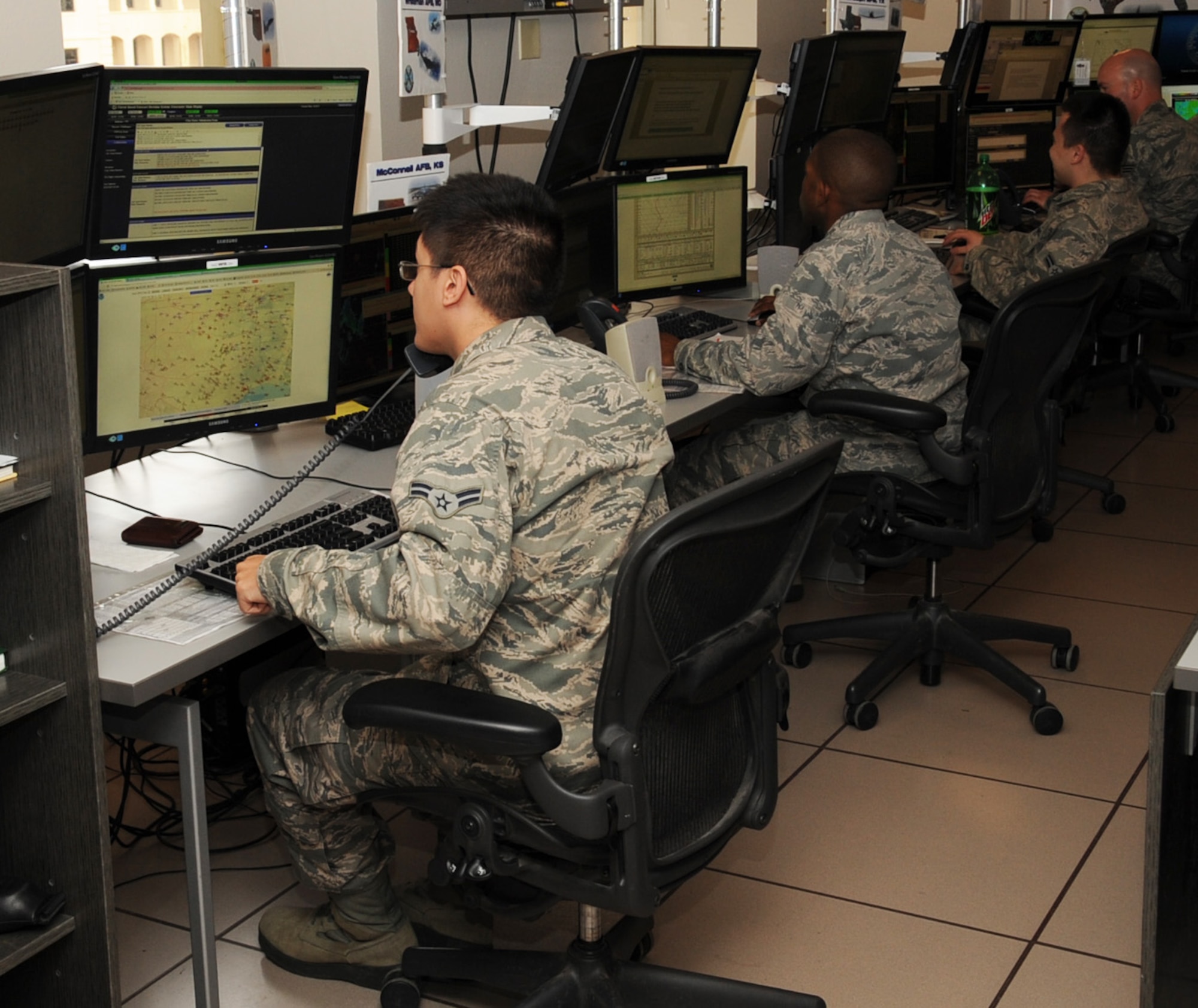 Airmen from the 26th Operational Weather Squadron follow the weather on Barksdale Air Force Base, La., Feb. 21. 26 OWS Airmen analyze weather data from 133 sites, creating forecasts and predictions impacting more than 680,000 military personnel. (U.S. Air Force photo/Senior Airman Sean Martin)