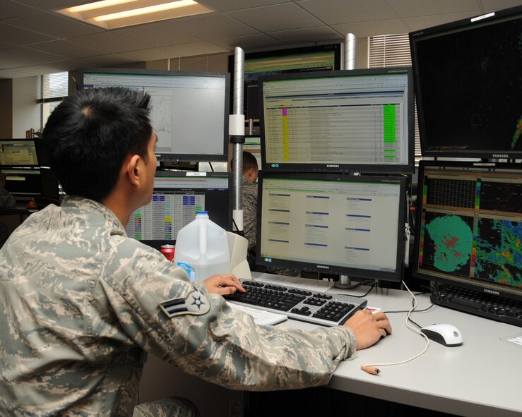 Airman 1st Class Andre Basay, 26th Operational Weather Squadron weather forecaster, tracks the weather on Barksdale Air Force Base, La., Feb. 21. The 26 OWS is responsible for forecasting weather and issuing warnings for the entire southeast continental U.S. (U.S. Air Force photo/Senior Airman Sean Martin)