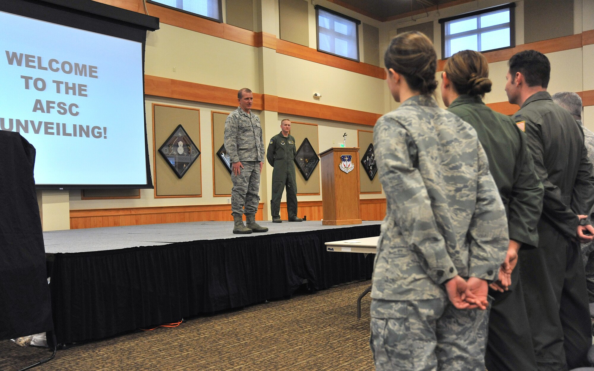 Col. Robert Stanley, 341st Missile Wing commander, talks to Team Malmstrom officers before receiving their new career during an Air Force Specialty Code unveiling at the Grizzly Bend on Feb. 14. Nearly 20 missileers received a new AFSC under nuclear, space, air craft maintenance or cyber operations. The Air Force split the space and missile career field to give officers more focused development in their respective areas. The split, affecting more than 3,000 officers Air Force-wide, aims to strengthen the nuclear enterprise. (U.S. Air Force photo/John Turner)