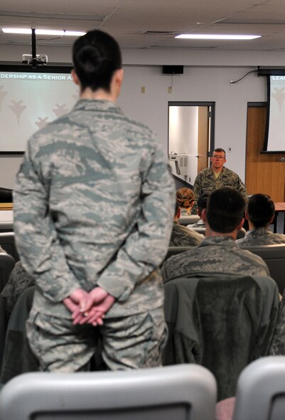 Senior Airman Kelli Hill, 341st Force Support Squadron Force Management journeyman, poses a question to Chief Master Sgt. Ron Beadles, 341st Medical Group superintendent, during the “Continue to Rise: Arise as a Leader” Airman development seminar Feb. 12 in the conference room in Bldg. 3080. The half-day seminar included seven instruction blocks, each geared toward developing Airmen as leaders. (U.S. Air Force photo/Staff Sgt. R.J. Biermann) 